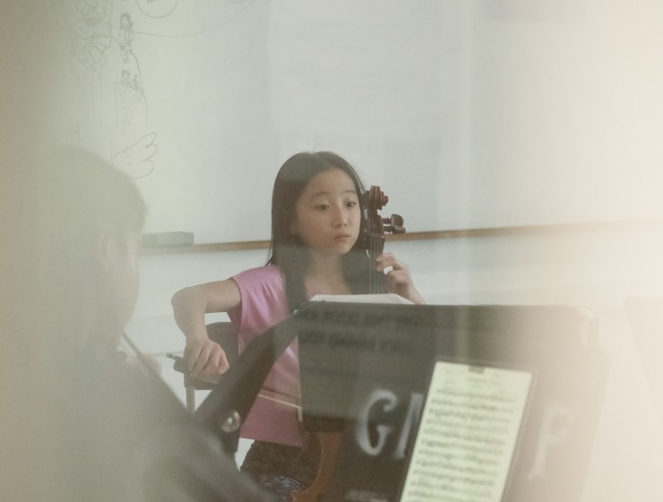 a student playing cello