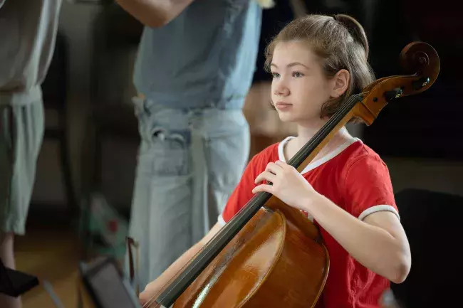 a young cellist playing